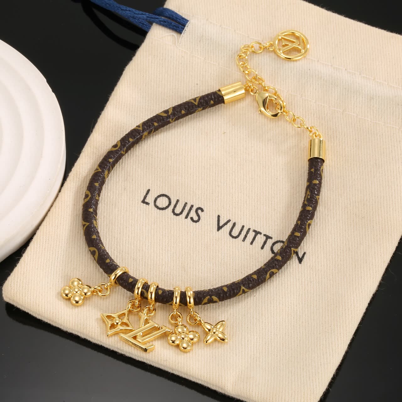 Louis Vuitton Monogram Leather Bracelet with Gold Charms